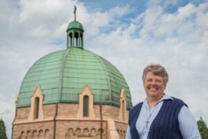 Sister Charlene photo with the Motherhouse dome over her shoulder