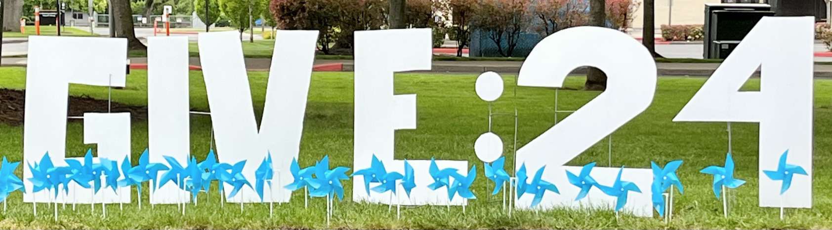 Give 24 Thank You cut outs with blue windmills in front
