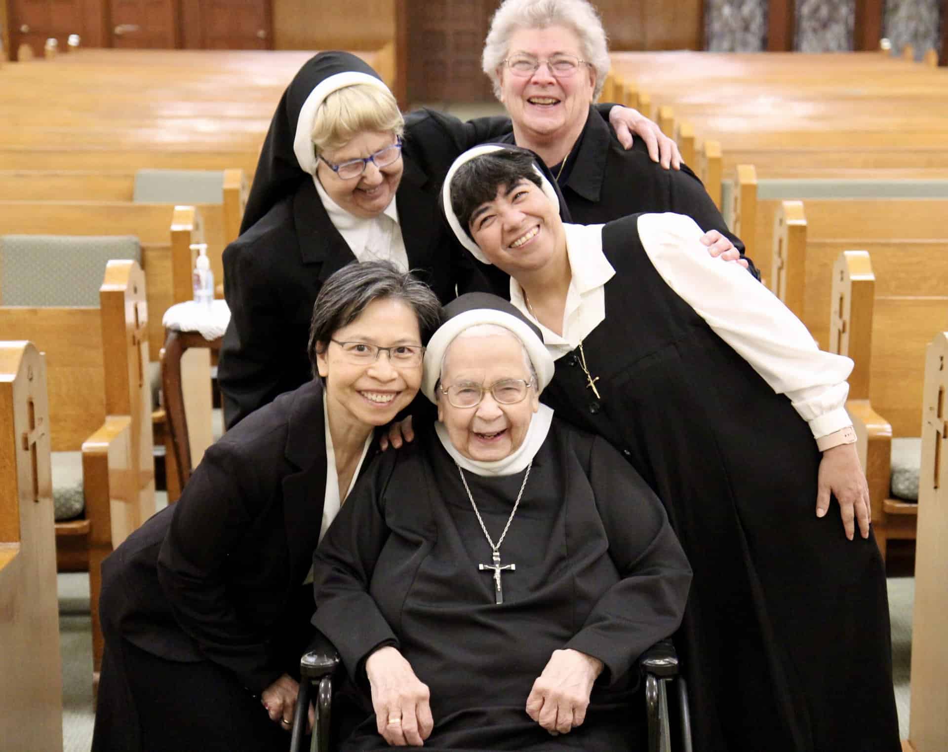 Sisters Clare Vandecoevering, Julie Doan, Theresa Ann Bunker, Patricia Lulay, and Juana Gutierrez have a laugh together during J