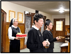 Sisters offering mass
