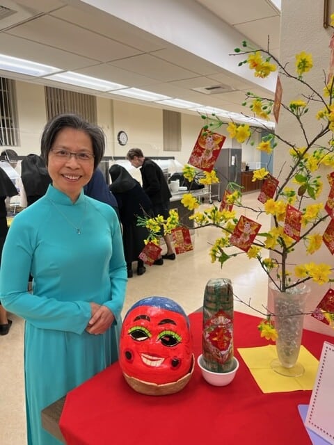 Photos show the decorations, traditional clothing, and food which was prepared by our Sisters
