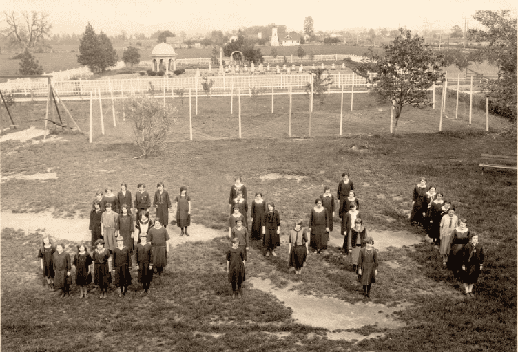 Students at St. Mary’s Institute gathered on the lawn.