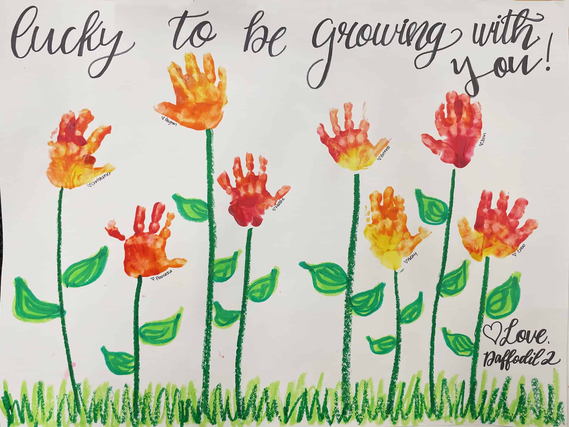 Painting of flowers from Early Learning School students' hands