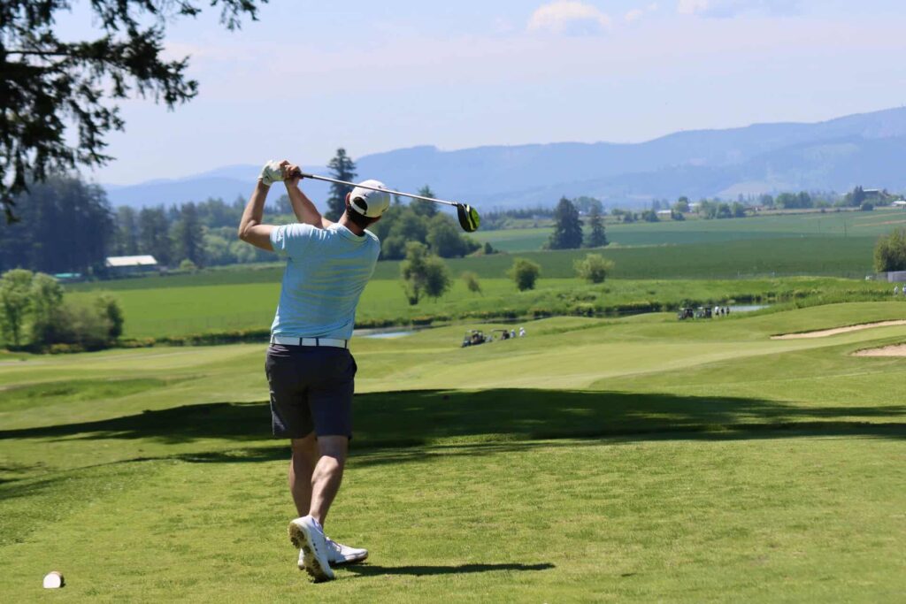Golfer follow through swing