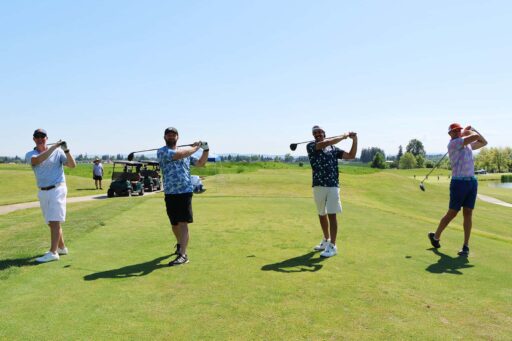Four golfers in swing Pose