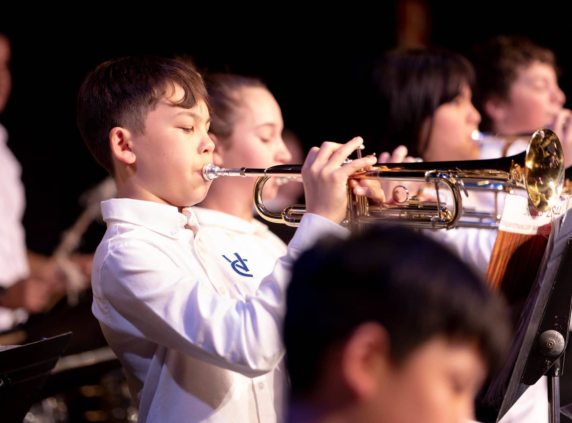 Middle School student playing trumpet