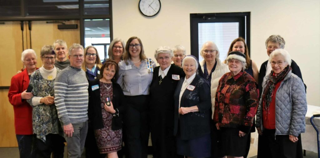 Sister Catherine Hertel with Srs. Sara Goggin, Charlene Herinckx, and Rita Watson and members of the Tabitha Moffatt Brown - David Hill Chapter, NSDAR