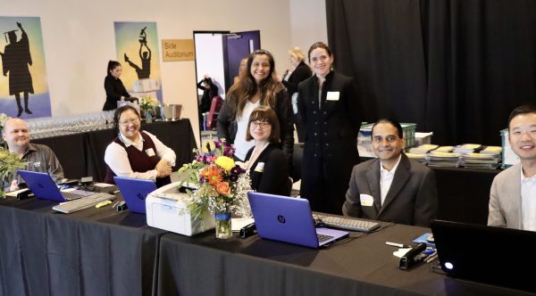 Alums volunteering at event