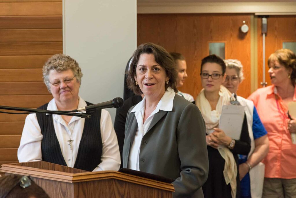 Kathleen at the podium in Maryville