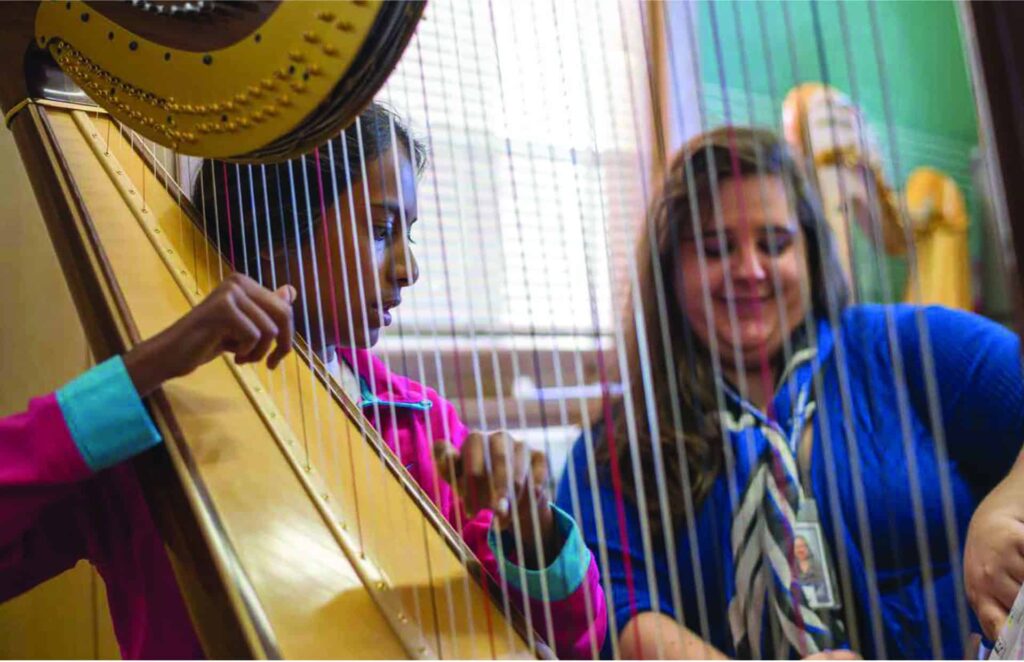 Teacher Misty Williams teaching student