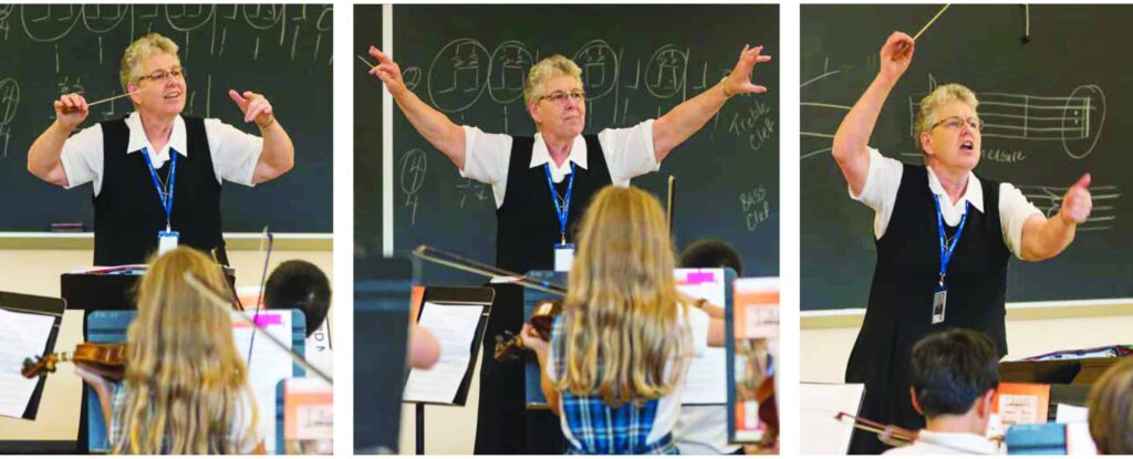 Sr Denise Klaas conducting the orchestra