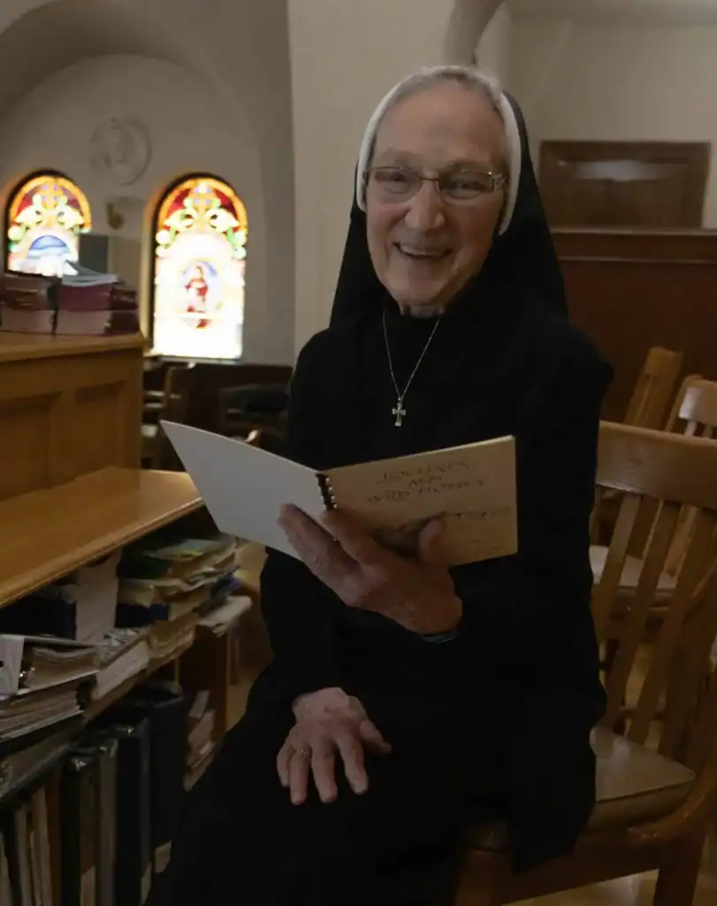 Sr John Therese singing