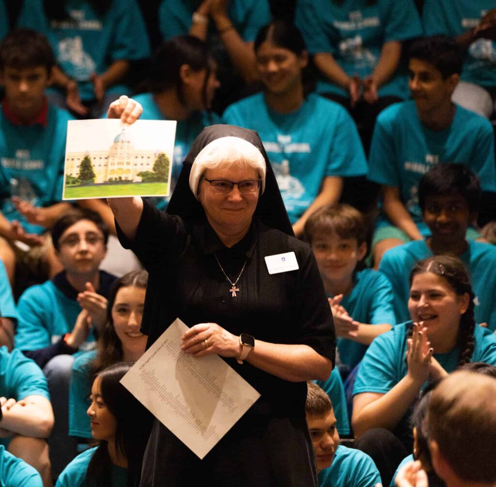 Sr. Michael Francine honors a V C M S student for her artwork