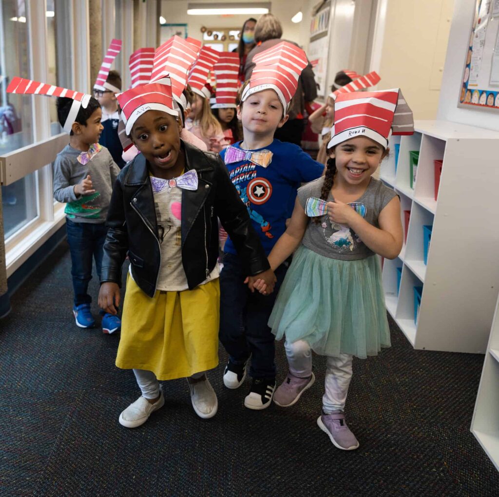 Valley Catholic Students walking in their self made "Cat in the Hat" hats