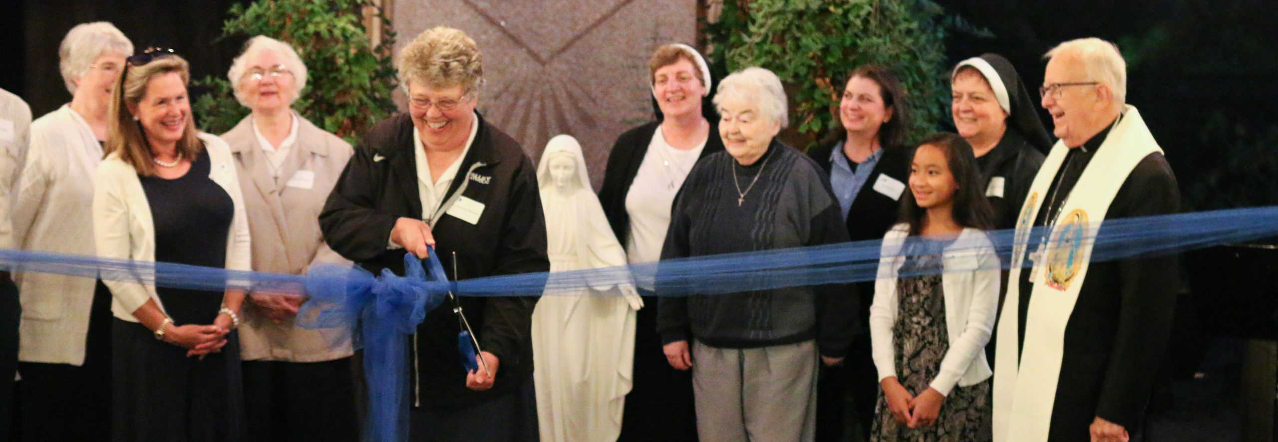 Ribbon cutting for Marian Garden reception