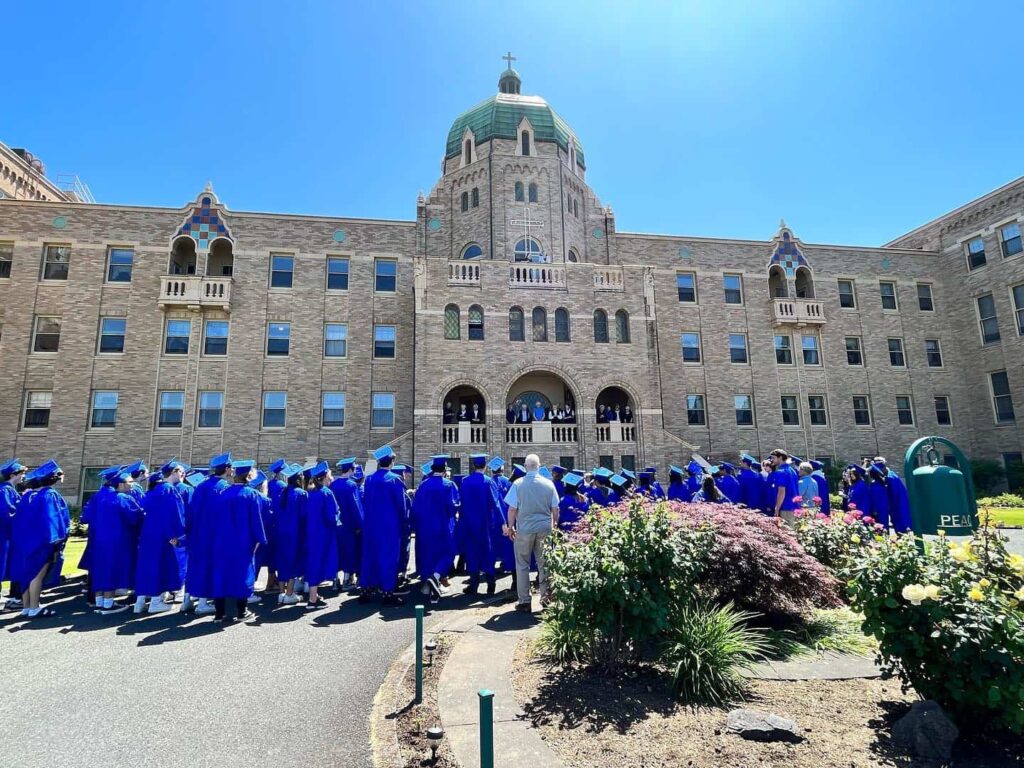 Senior walk in front of the Mother House