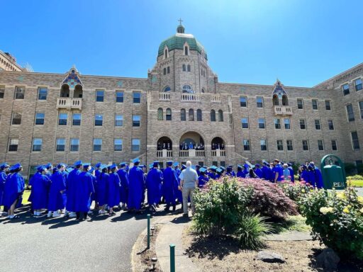 Senior walk in front of the Mother House