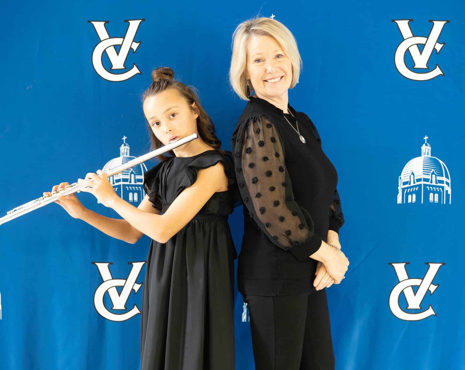 Beckie Hocker and flute student