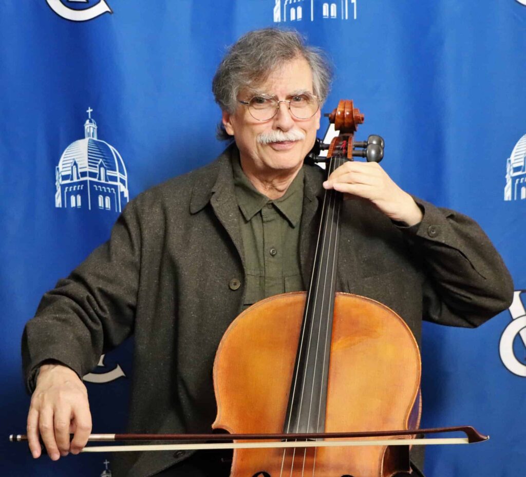 Collin Heade playing the cello