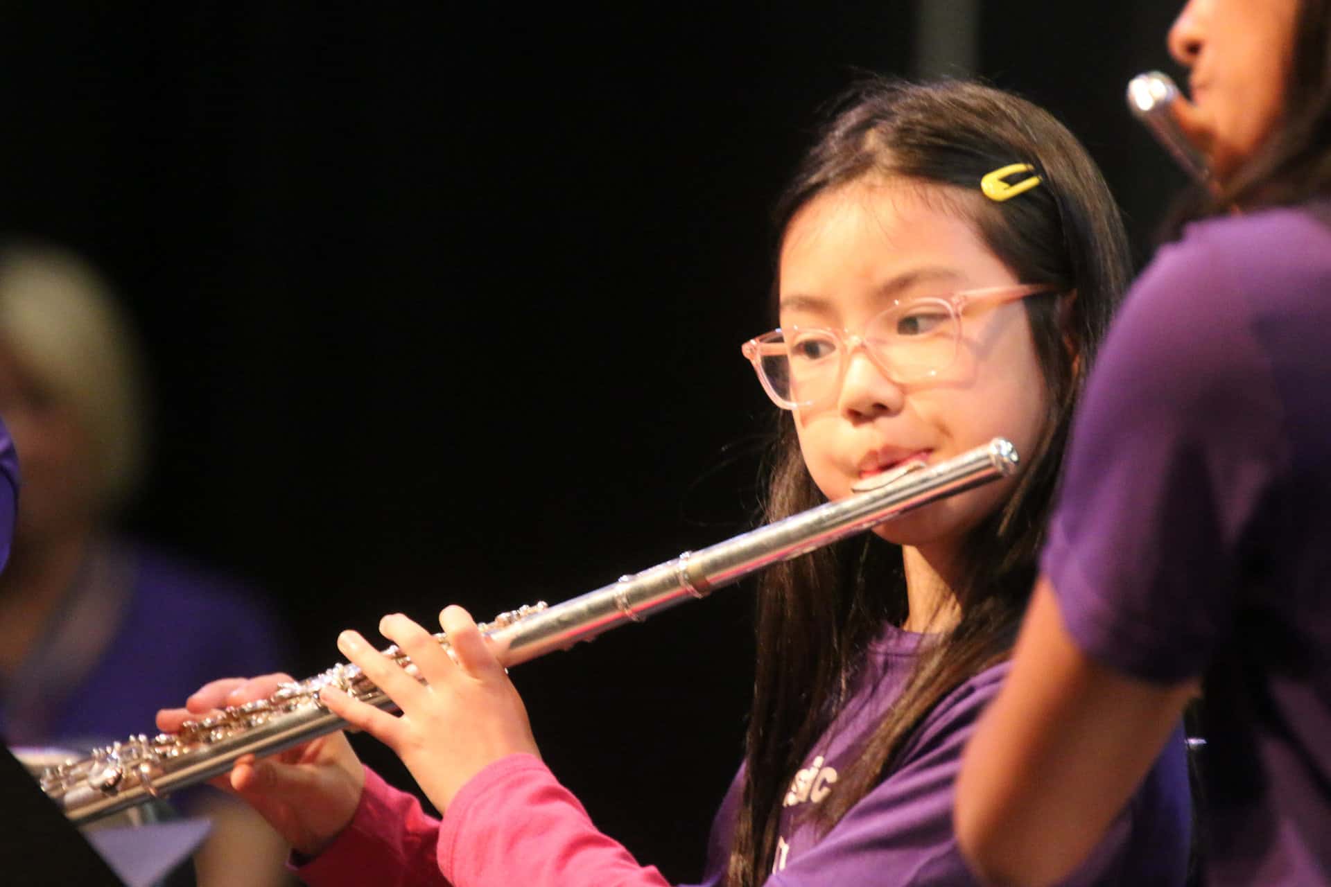 Music Camp; music student playing flute