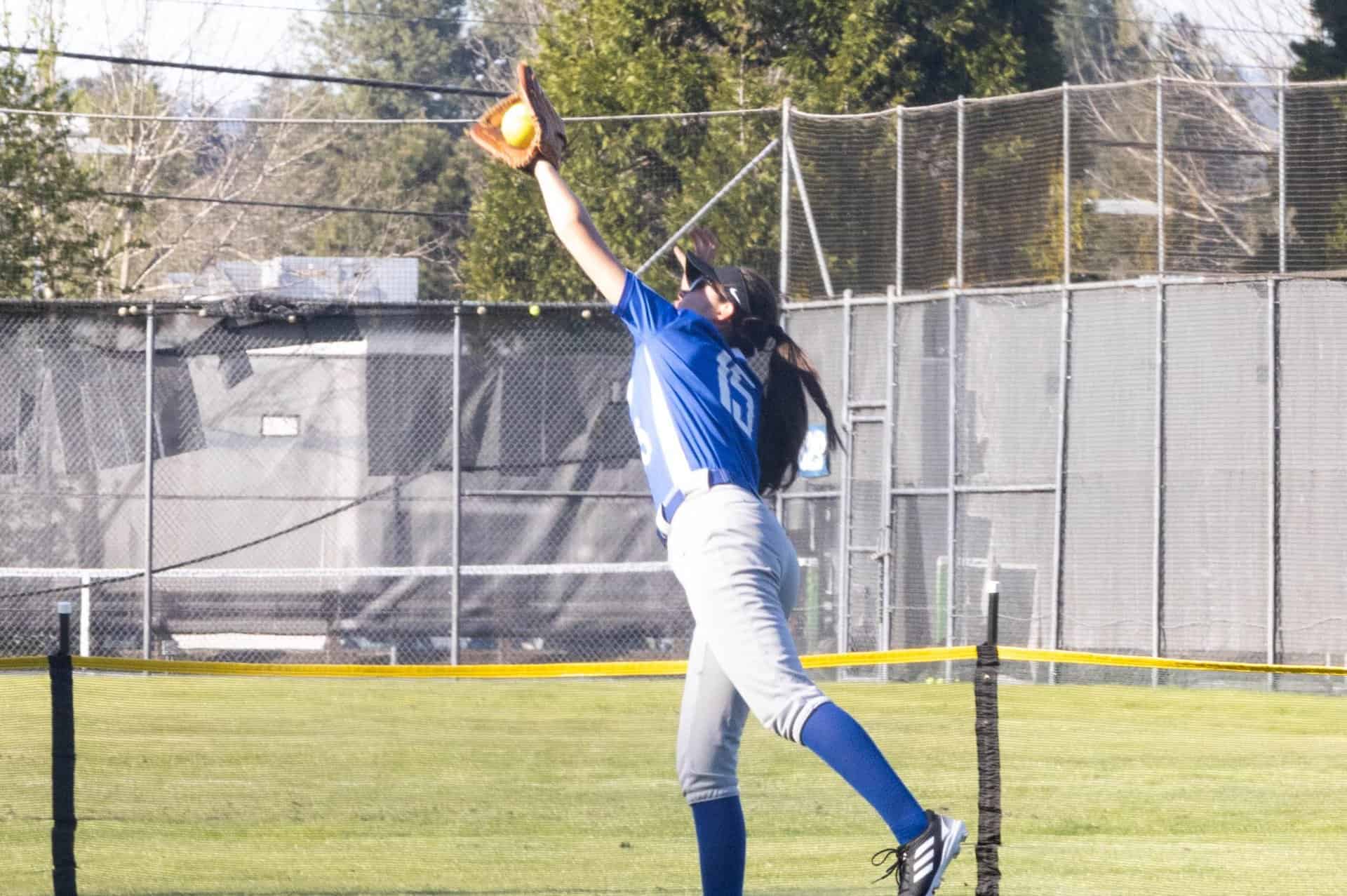 Softball team player making catch