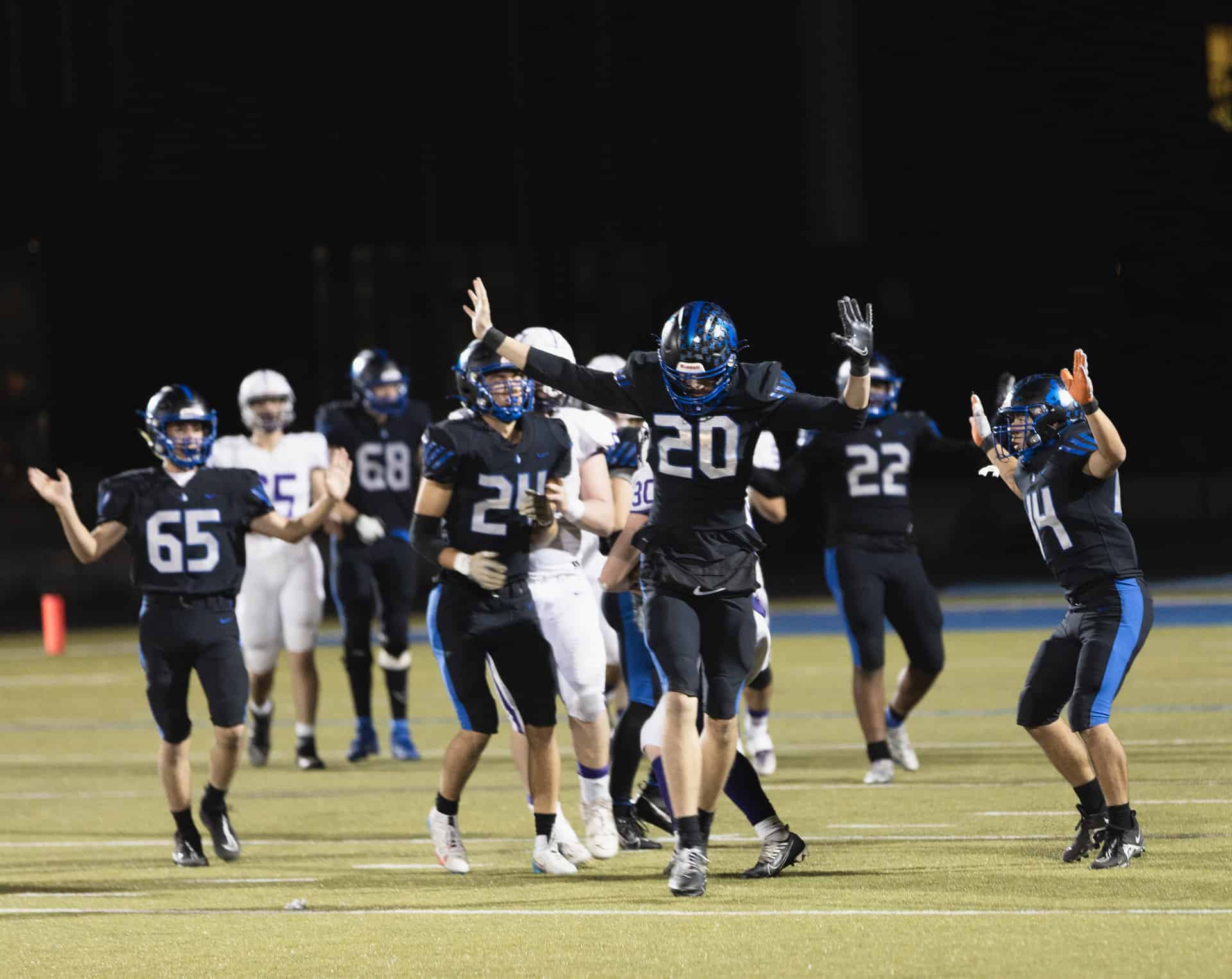 #20 celebrates a great tackle