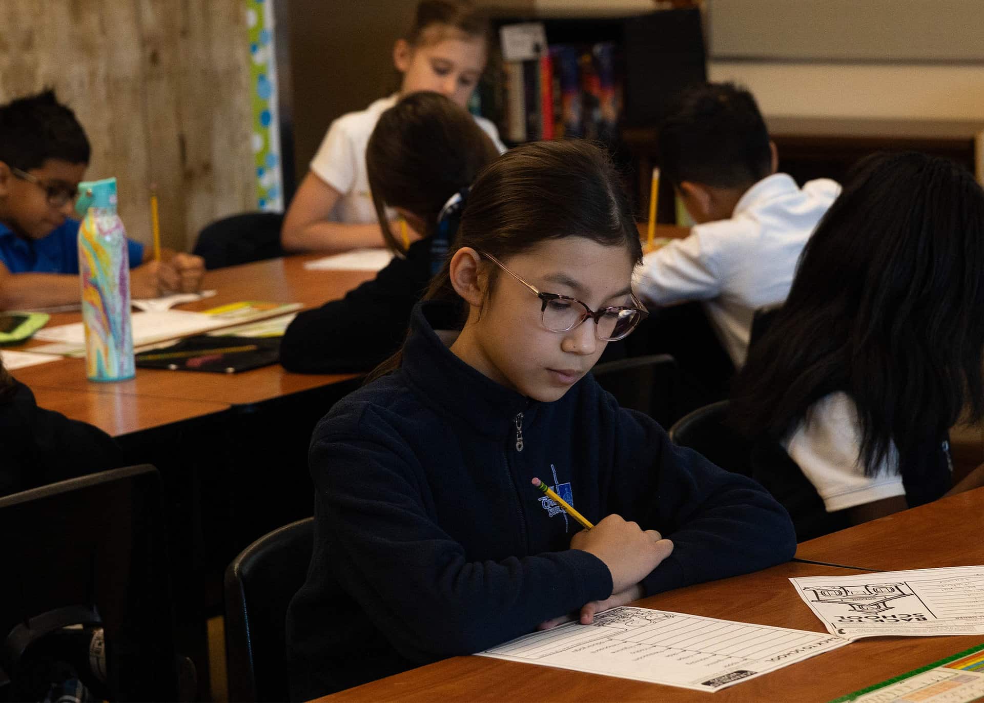 ES student studying; “Your gift” amount suggested donation