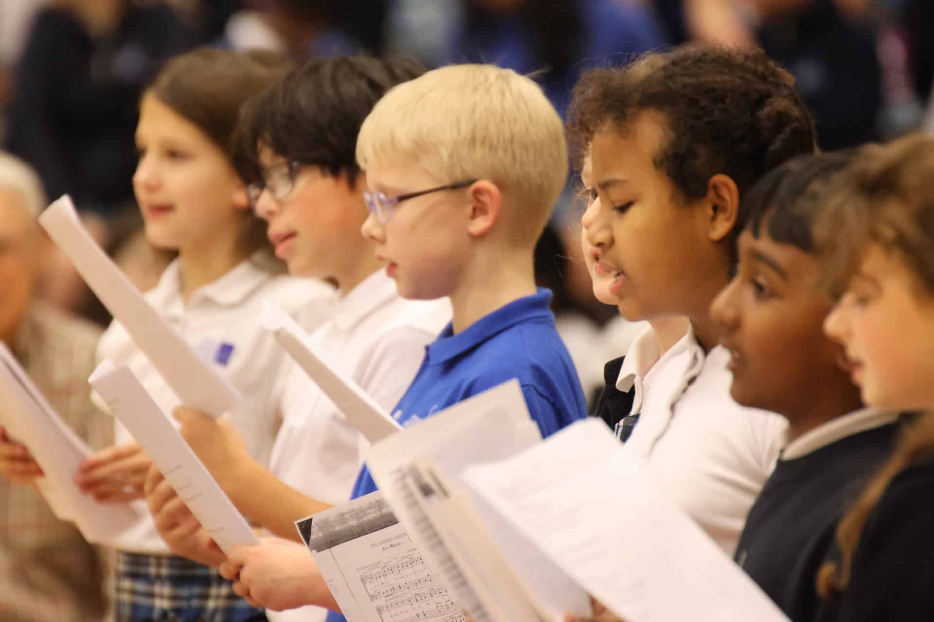 Students signing to grandparents