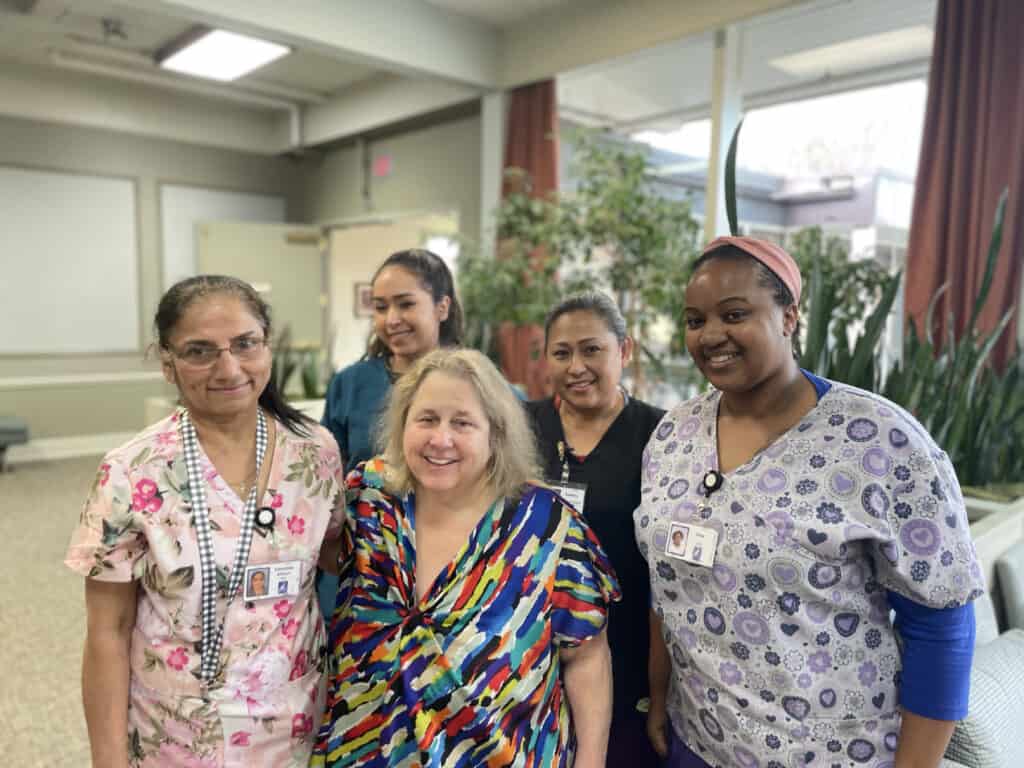 Christina Allison, left, and her fellow RNs