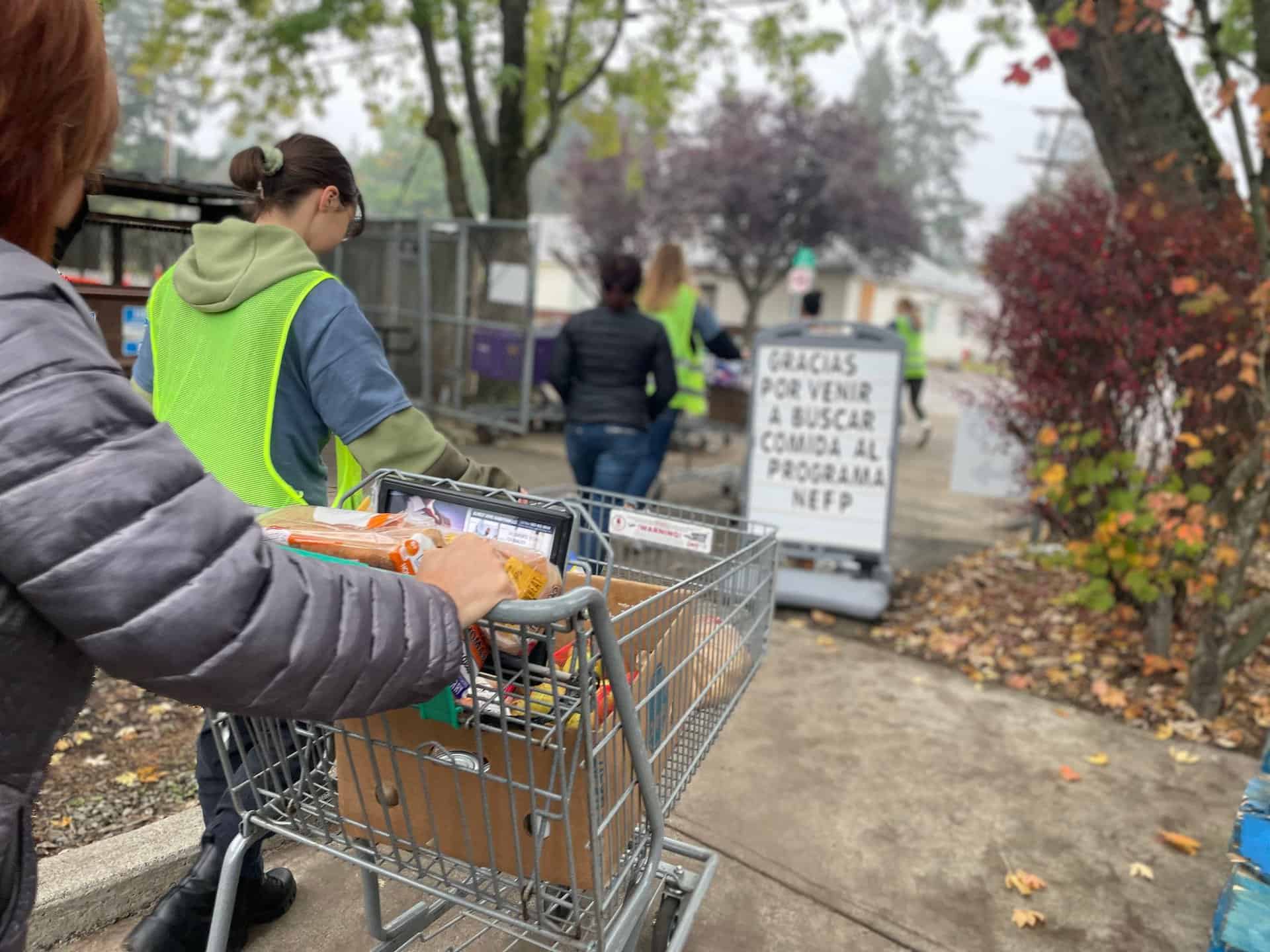 Students picking up food on Day of Service