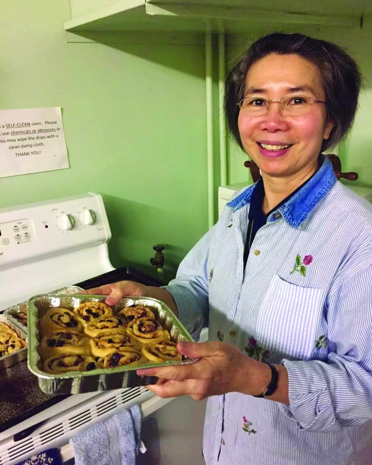 Sr. Theresa Lan serves her Sisters by baking fresh rolls each week