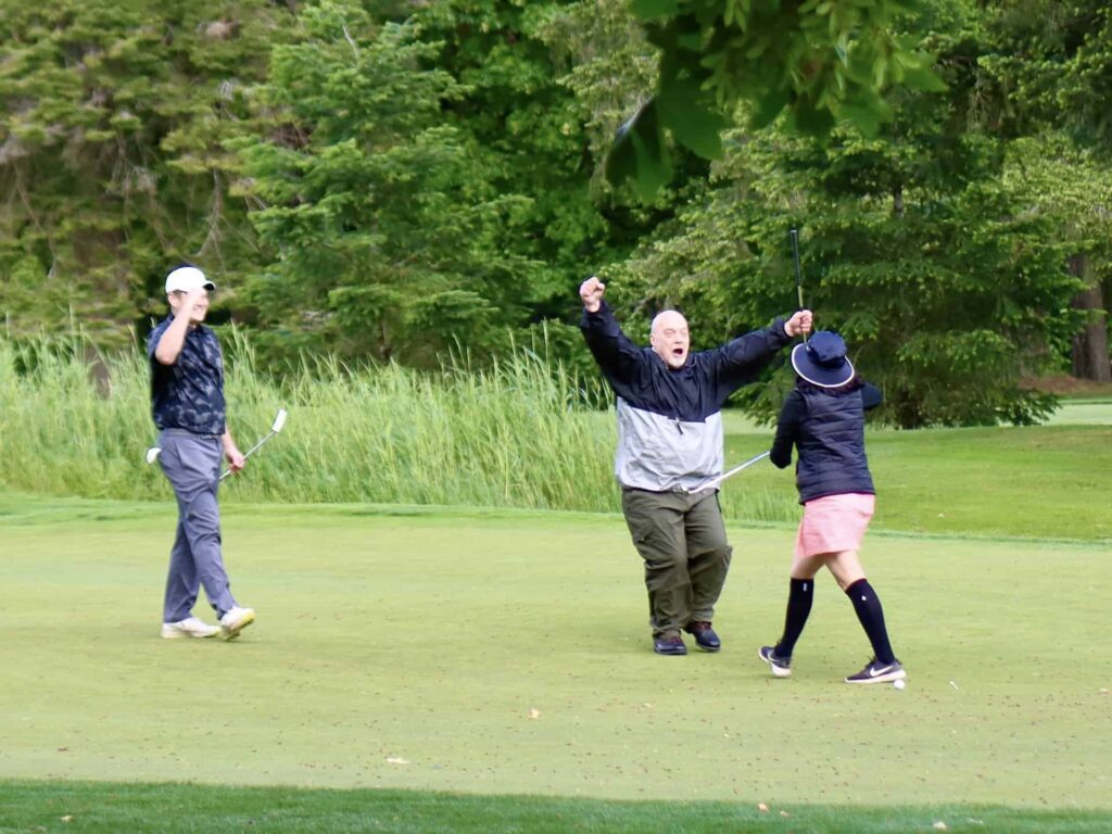 Sinking the putt golf