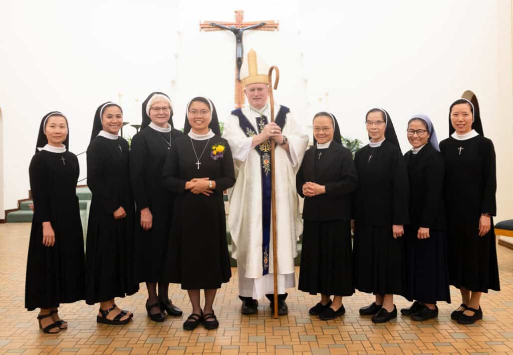 Sr. Thanh with Sisters and Bishop