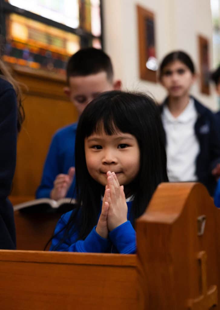 Vcs Student In Chapel Praying (1)