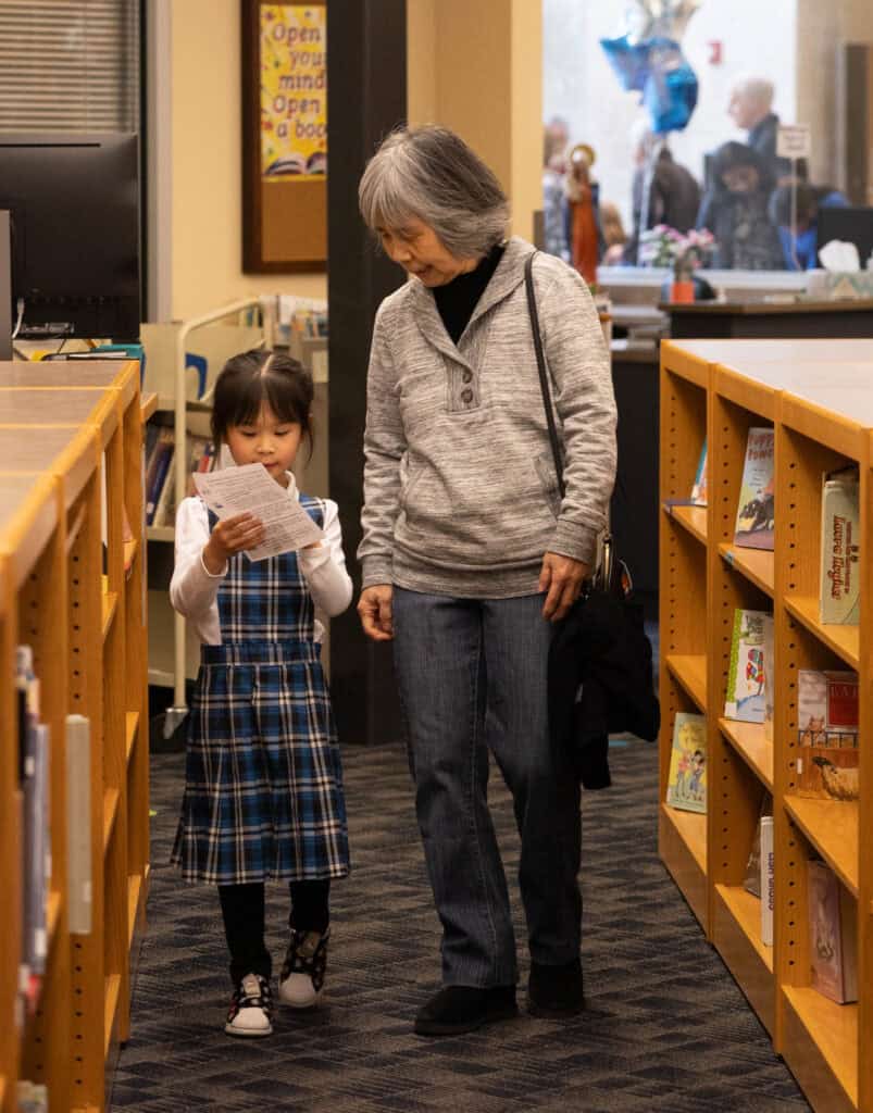 Grandparents Day - VCES student and grandparent in library