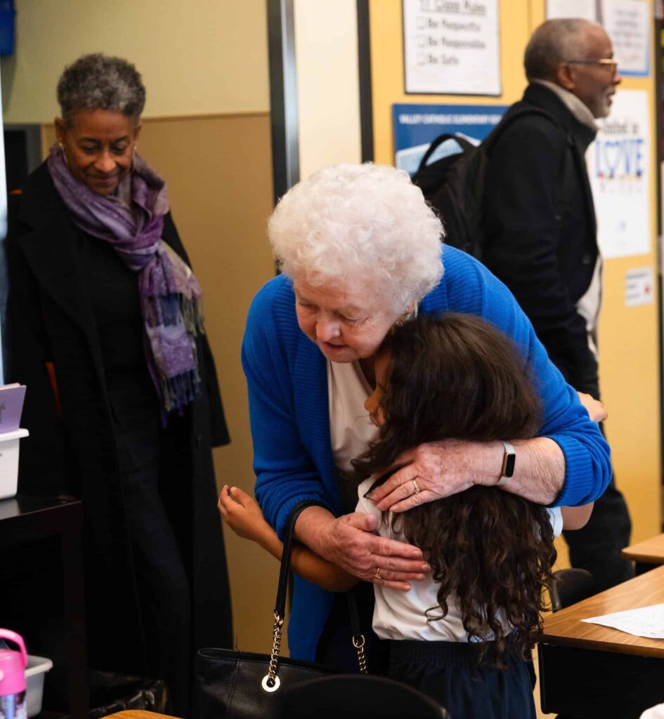 Proud grandmother hugs her VCES student at Grandparents Day