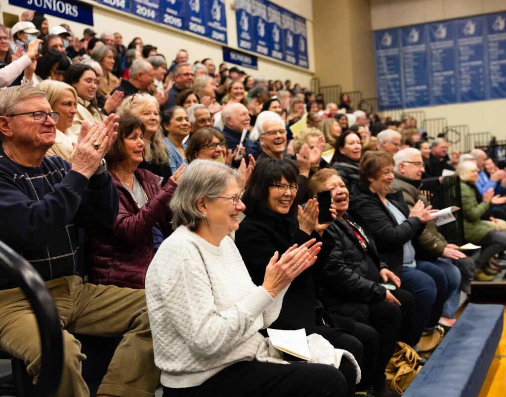 Grandparents and special friends clap for VCES students