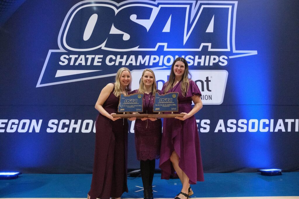 Charisma coaches -Jessica Anderson, Megan Hoffman, and Danielle Lomartire Upton win their 6th state title in three years.