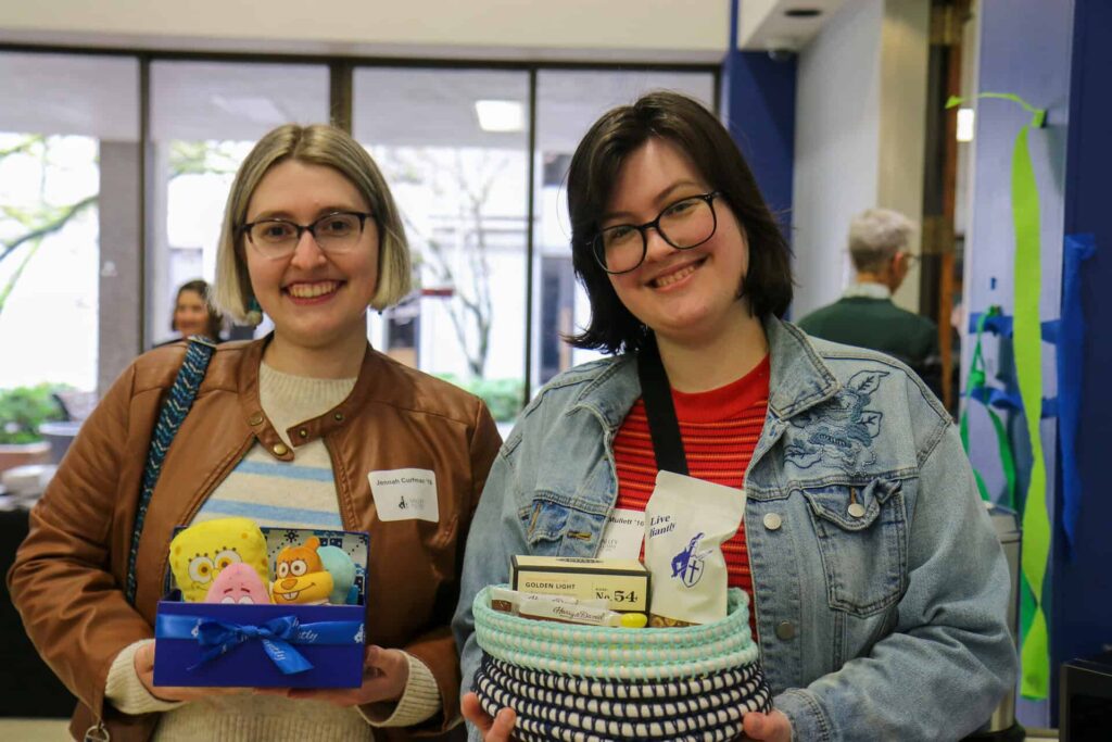 Jenah Curfman and McKenzie Mullet win raffle prizes at VC's "The SpongeBob Musical."