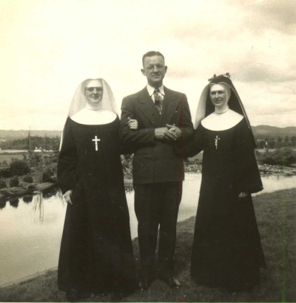 Left to right - Sr. Theresa Hathaway, Stan Hathaway and Sr. Mary Ann Hathaway. Sr. Mary Ann had just made her vows.