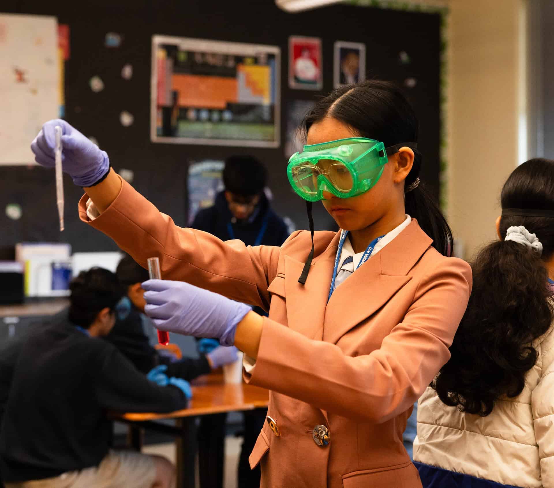 Women in STEM - VCMS student conducts an experiment