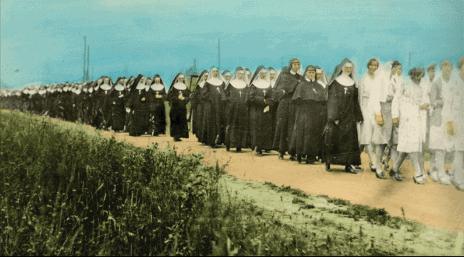 The Sisters walked in a procession from the original St. Mary’s Institute to lay the cornerstone for the new (current) Motherhouse