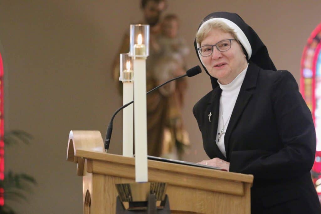 Sr. michael francine at the podium at jubilee mass 2025