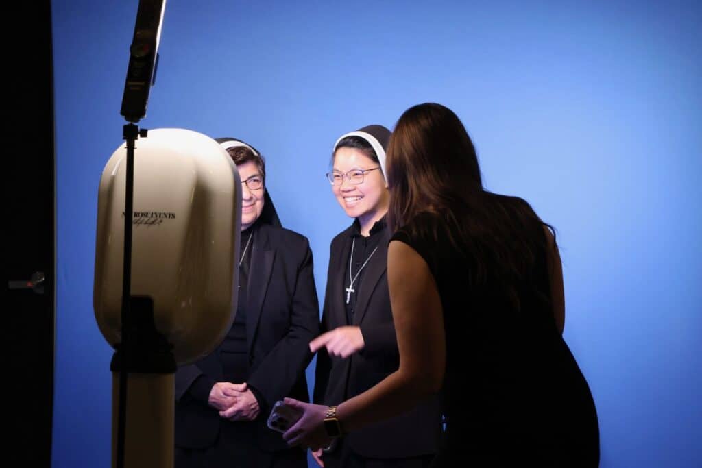 Sisters enjoy gala photo booth