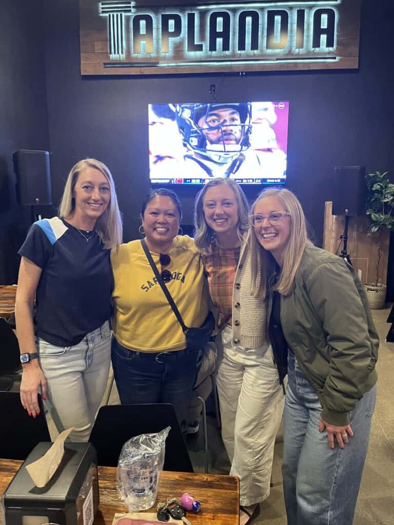 Alumni cheer on daniel hardy at taplandia