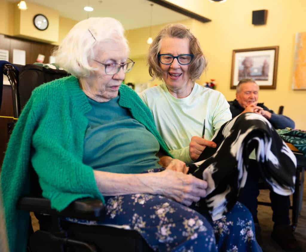Missy and marilyn make a quilt at maryville