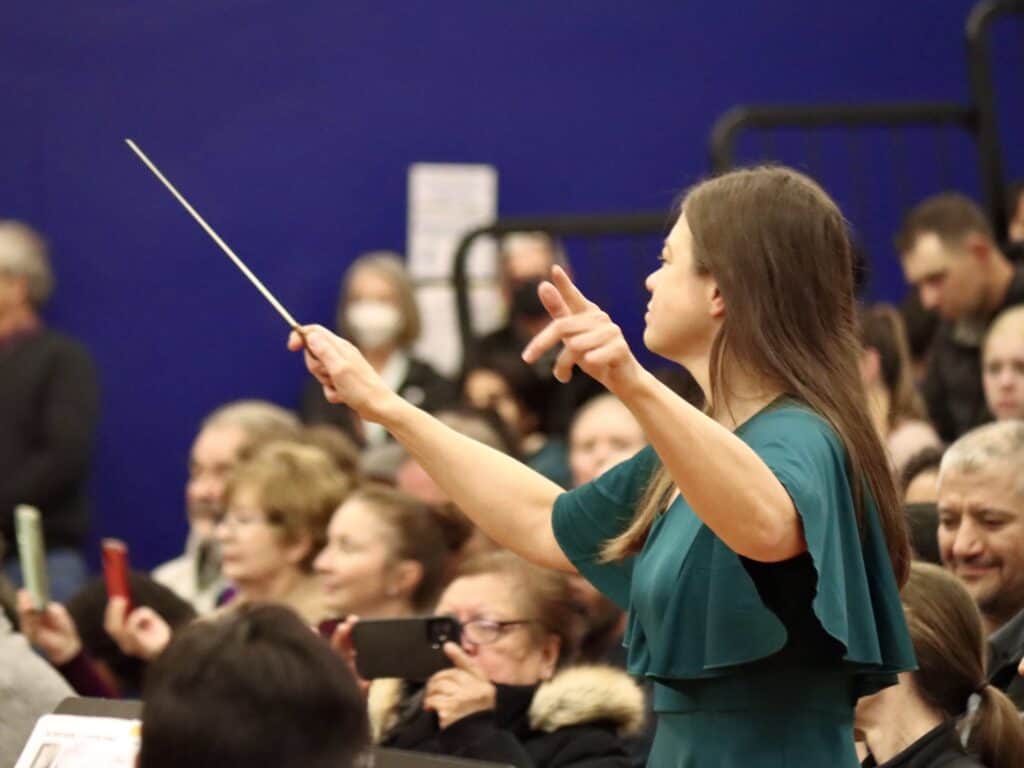 Emily conducts the VCES orchestra