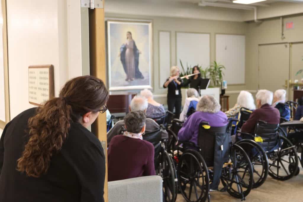 Maryville Staff looking in on the performance