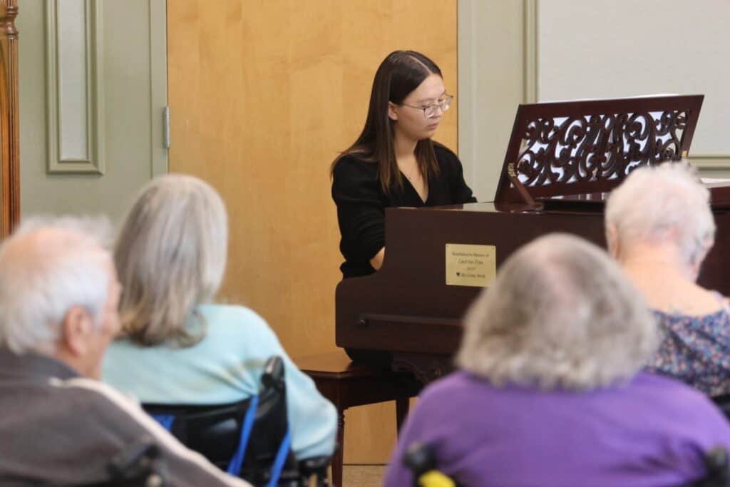 Zora at the piano in Maryville