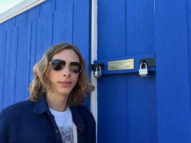 Luke Pranger at the door of his ticket booth